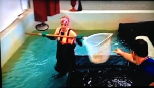 Lowell and Julie try to net fish